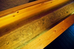 Vardø kindlus. King Christian IV once visited the second fortress in Vardø, in 1599. In one of the small buildings he bumped his head into a beam in the ceiling. He ordered this to be taken down, and he later signed it. After that every royalty that visited, also signed it.